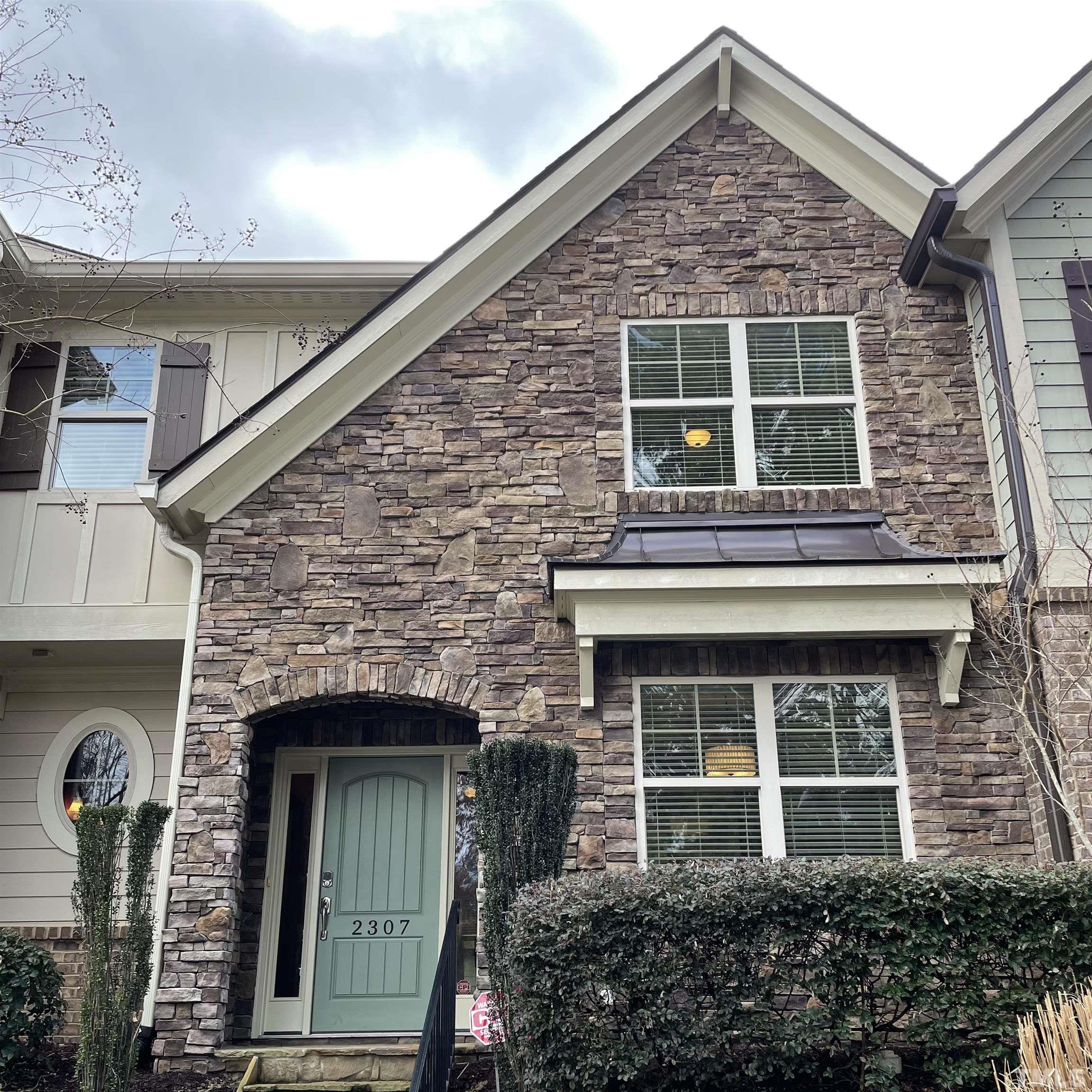 2307 Lowden Street Raleigh, NC 27608 - Photo 1 of 10 a front view of a house with plants