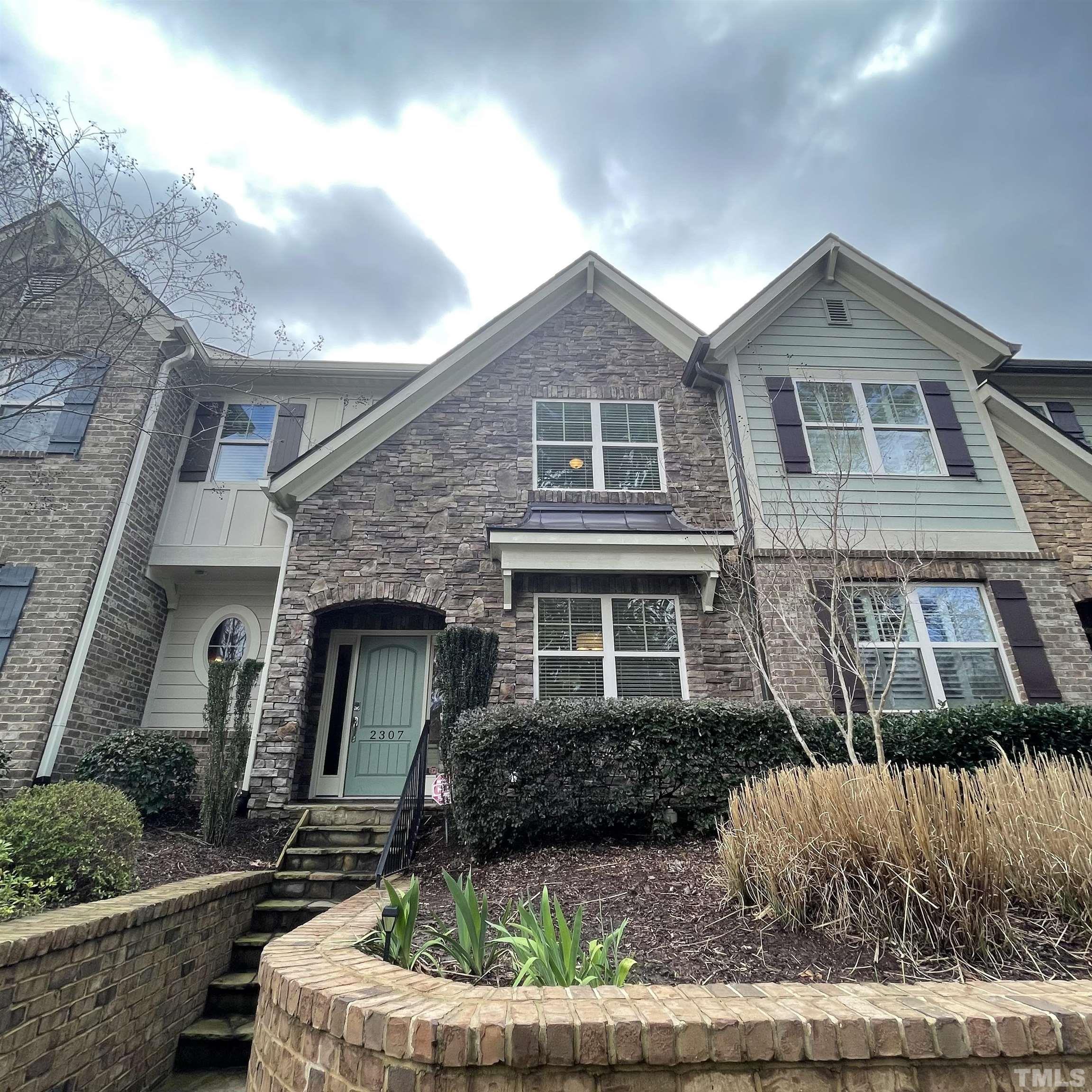 2307 Lowden Street Raleigh, NC 27608 - Photo 2 of 10 a front view of a house with garden