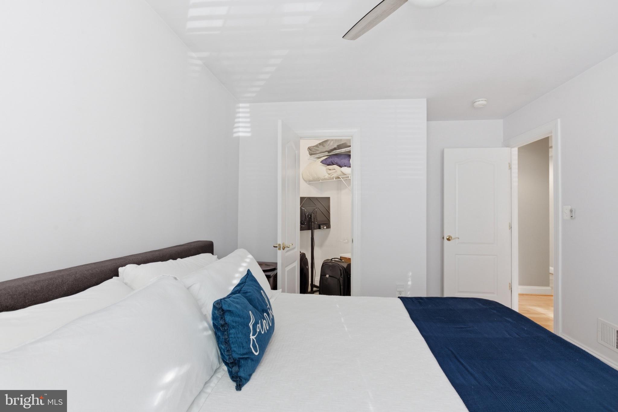 1219 Meadow View Road Pasadena, MD 21122 - Photo 38 of 70 Serene bedroom with modern touches.