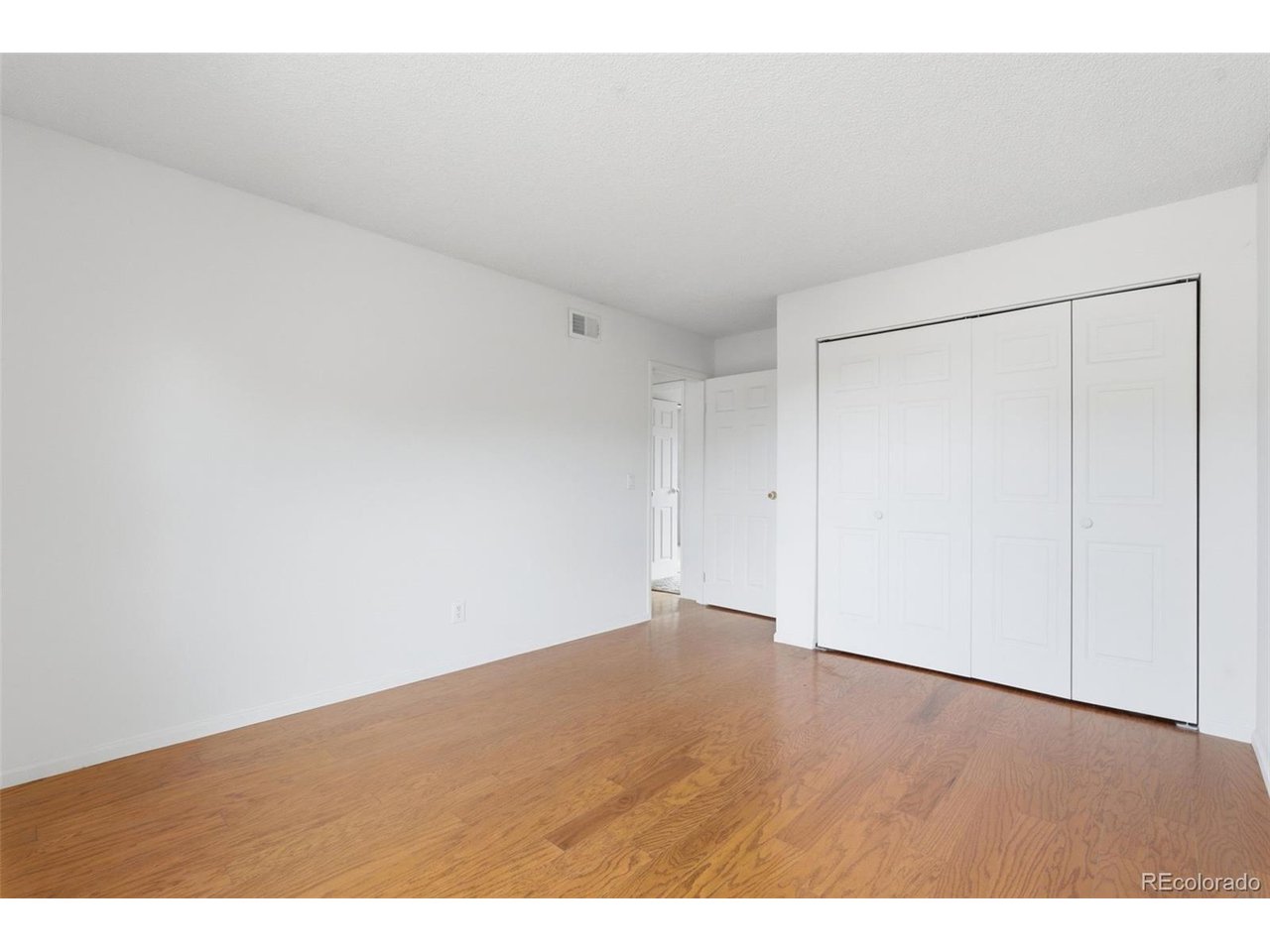 10251 West 44th Avenue, Unit 208 Wheat Ridge, CO 80033 - Photo 18 of 28 a view of an empty room