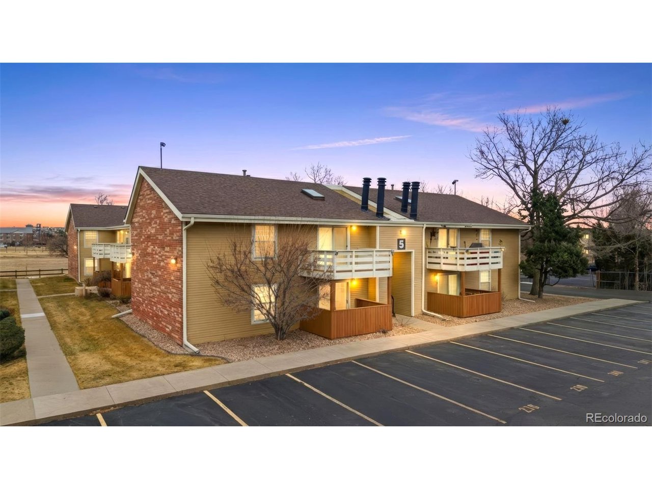10251 West 44th Avenue, Unit 208 Wheat Ridge, CO 80033 - Photo 2 of 28 a black and white photo of a building
