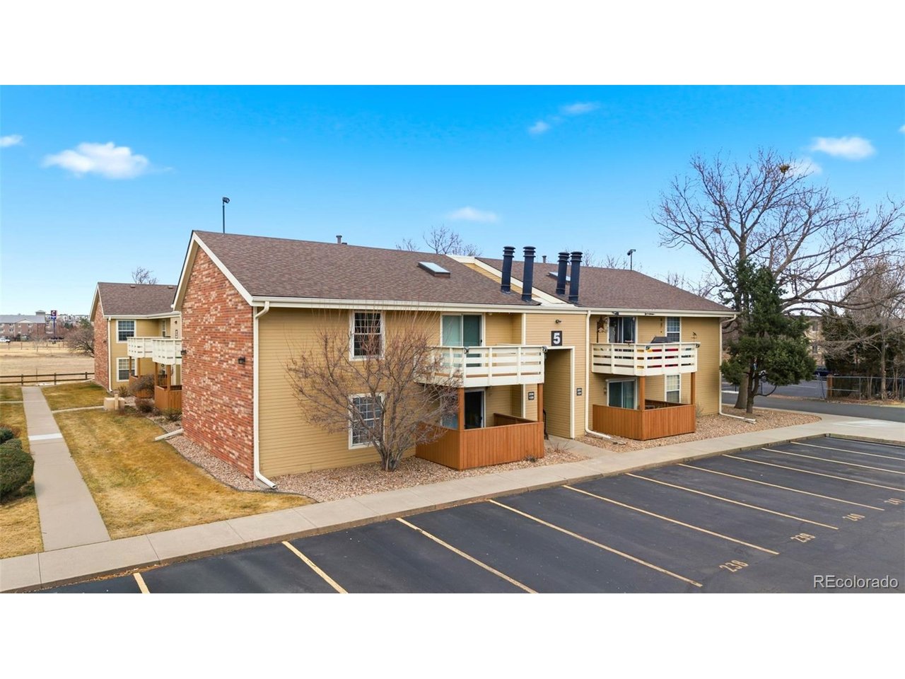 10251 West 44th Avenue, Unit 208 Wheat Ridge, CO 80033 - Photo 28 of 28 a upper view of a building with street