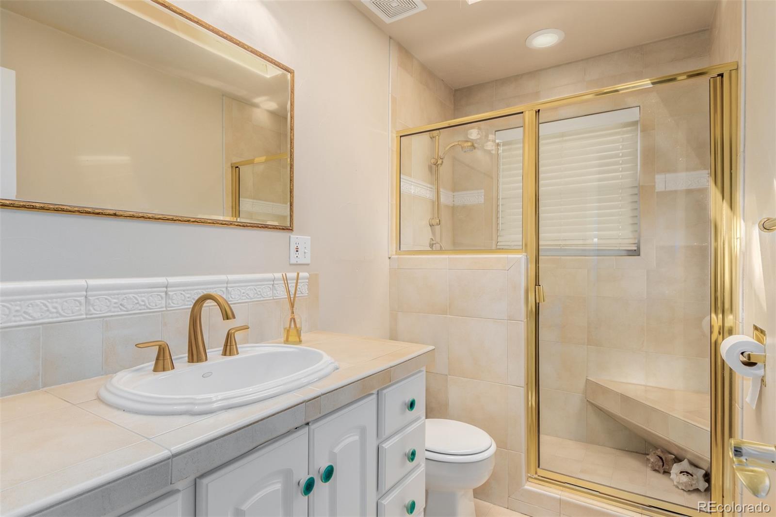 200 East Caley Avenue Centennial, CO 80121 - Photo 27 of 49 a bathroom with a sink toilet and shower