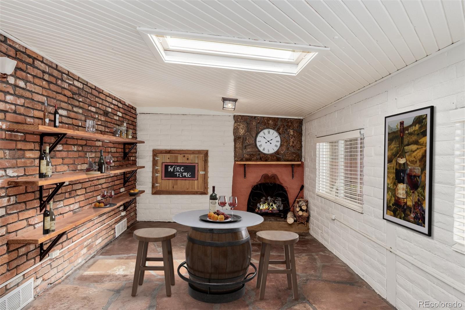 200 East Caley Avenue Centennial, CO 80121 - Photo 28 of 49 a living room with furniture and a fireplace