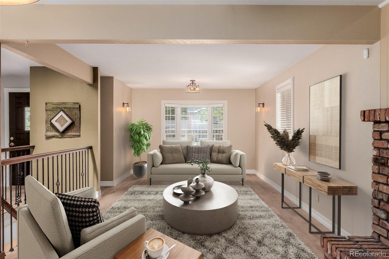 200 East Caley Avenue Centennial, CO 80121 - Photo 3 of 49 a living room with furniture and a table