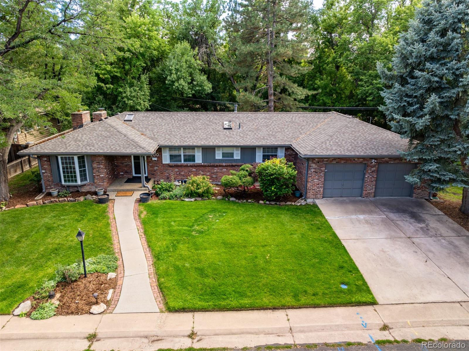 200 East Caley Avenue Centennial, CO 80121 - Photo 44 of 49 a front view of a house with a yard