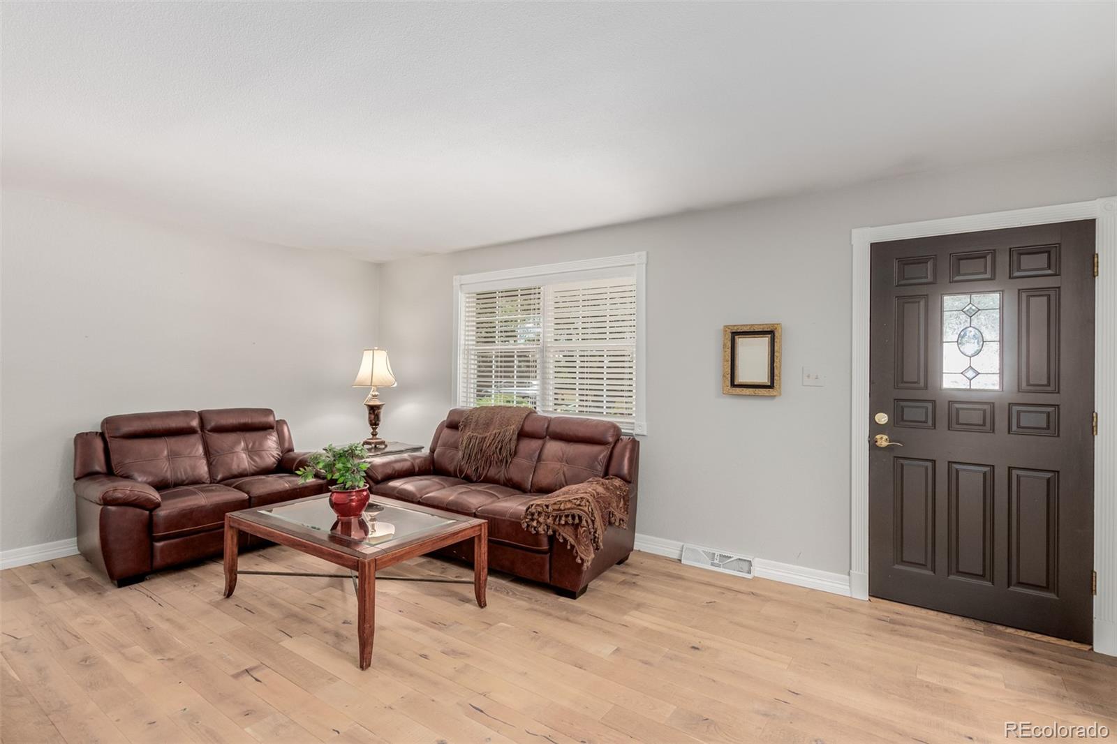 200 East Caley Avenue Centennial, CO 80121 - Photo 6 of 49 a living room with furniture and a window