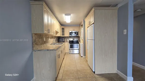 $240,000 | 10090 Northwest 80th Court, Unit 1406, Hialeah Gardens, FL 33016