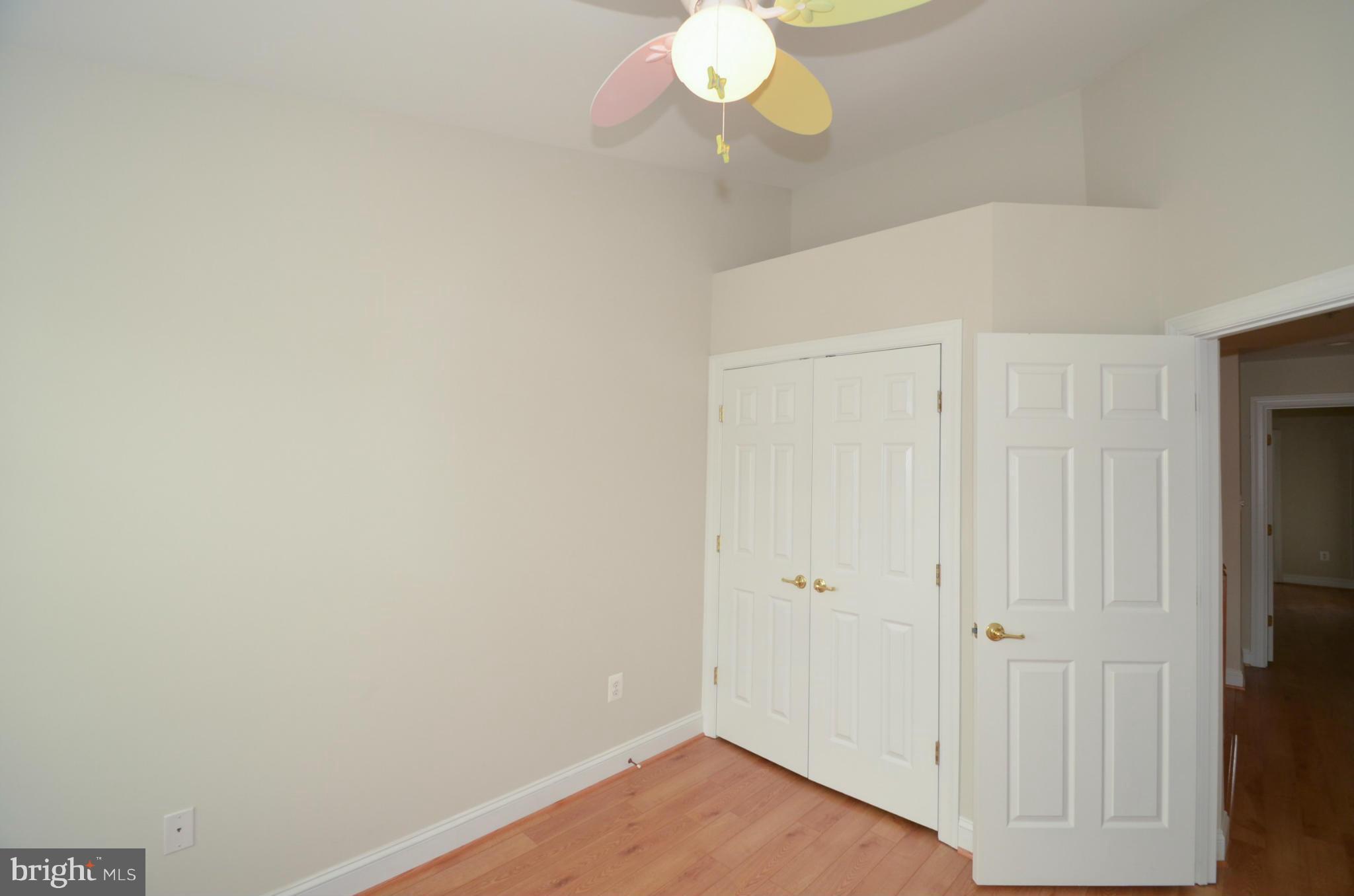 8306 Merlot Lane, Unit 137 Laurel, MD 20723 - Photo 18 of 30 a view of a room with wooden floor
