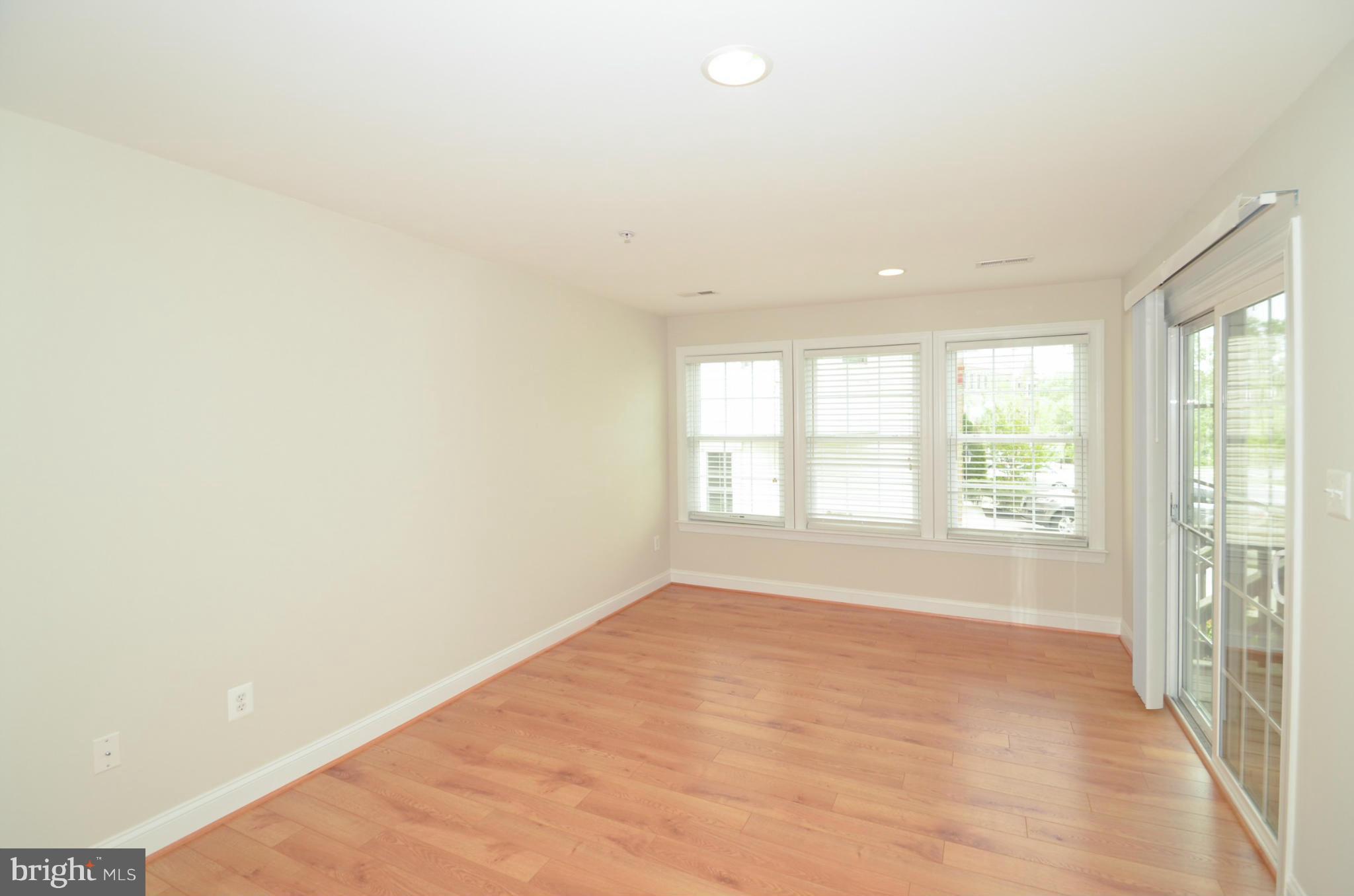 8306 Merlot Lane, Unit 137 Laurel, MD 20723 - Photo 27 of 30 a view of an empty room with a window