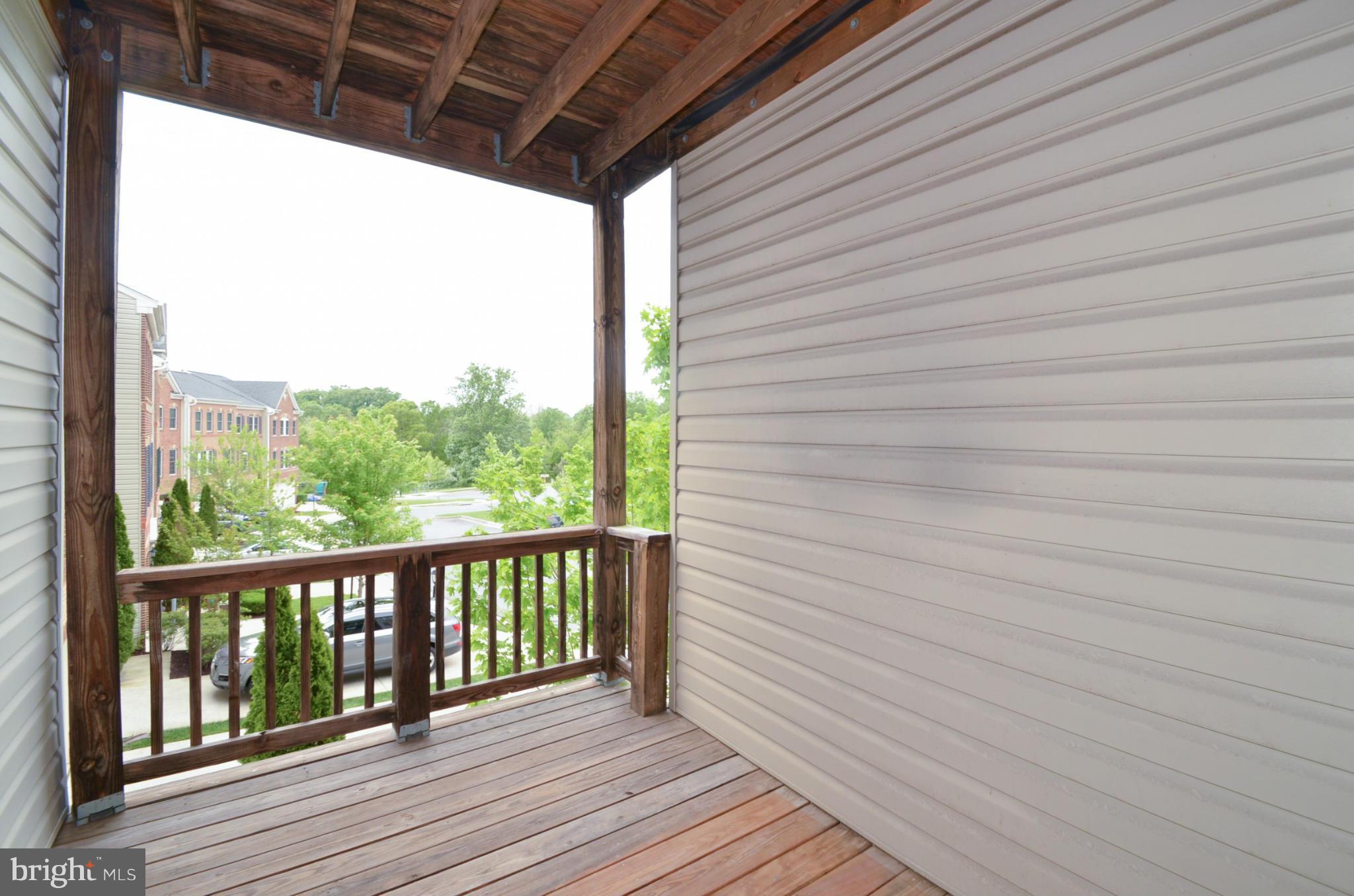 8306 Merlot Lane, Unit 137 Laurel, MD 20723 - Photo 29 of 30 a view of a wooden deck