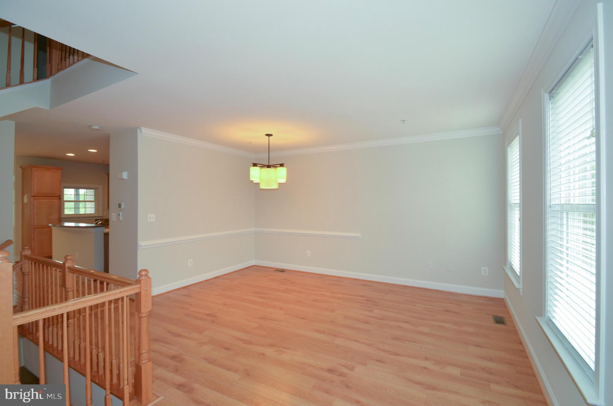 8306 Merlot Lane, Unit 137 Laurel, MD 20723 - Photo 4 of 30 a view of an empty room and window