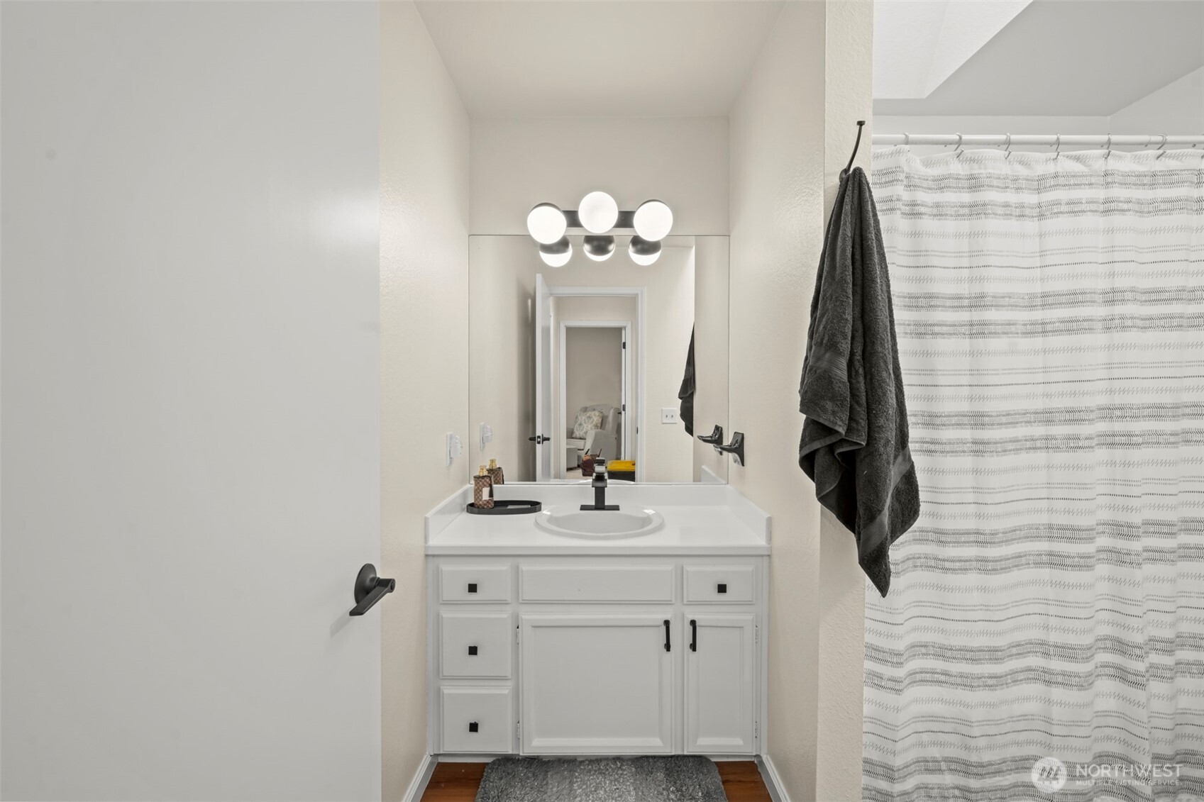 5615 114th Street Southwest Mukilteo, WA 98275 - Photo 21 of 38 a bathroom with a sink vanity and a mirror