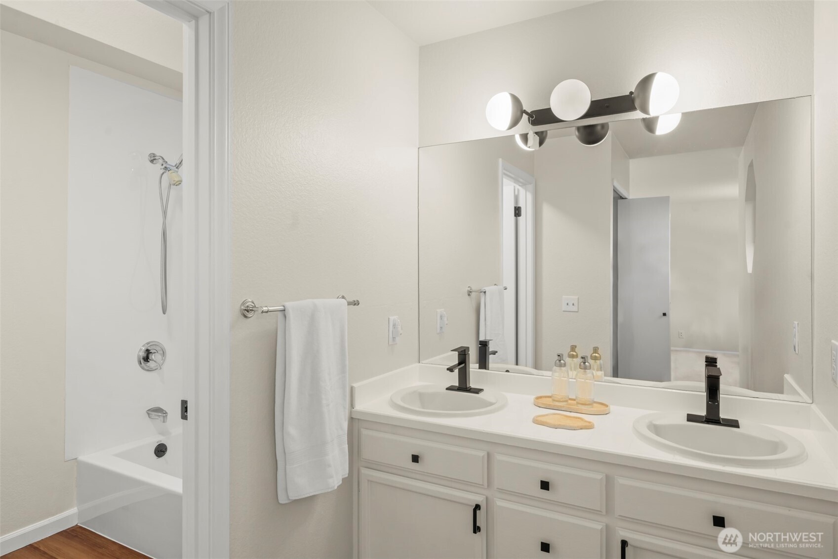 5615 114th Street Southwest Mukilteo, WA 98275 - Photo 23 of 38 a bathroom with a sink and a mirror