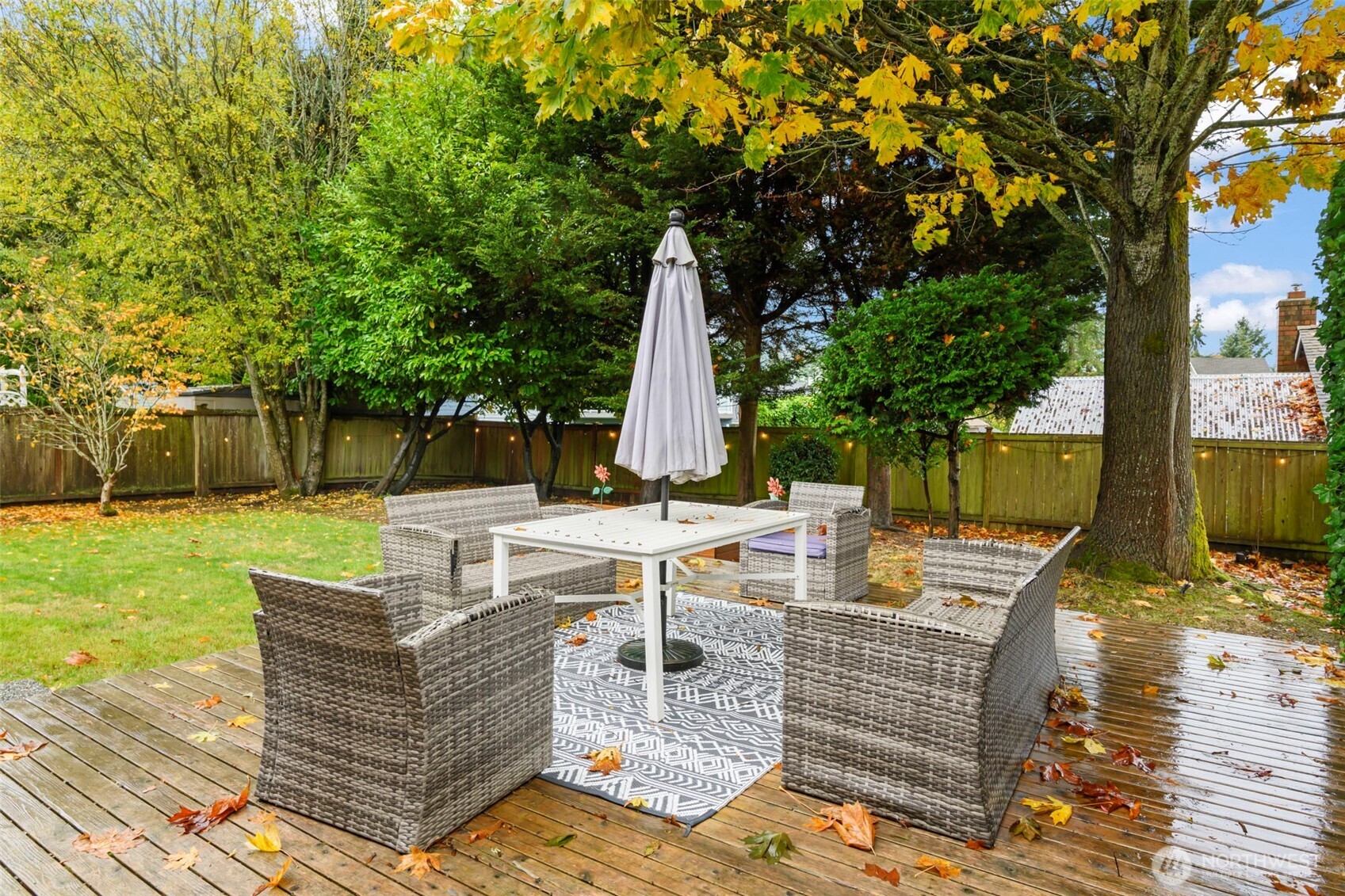 5615 114th Street Southwest Mukilteo, WA 98275 - Photo 33 of 38 a view of a patio with couches chairs and a yard