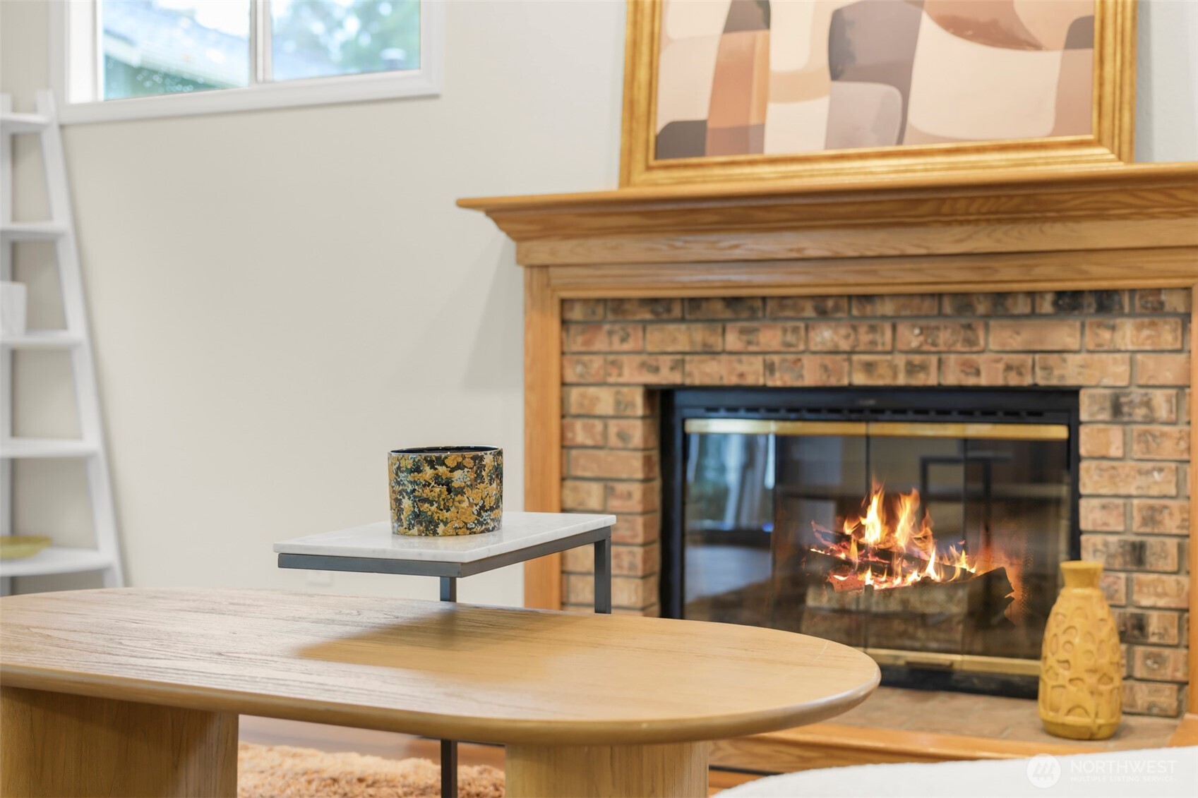 5615 114th Street Southwest Mukilteo, WA 98275 - Photo 8 of 38 a kitchen with a table and a fireplace