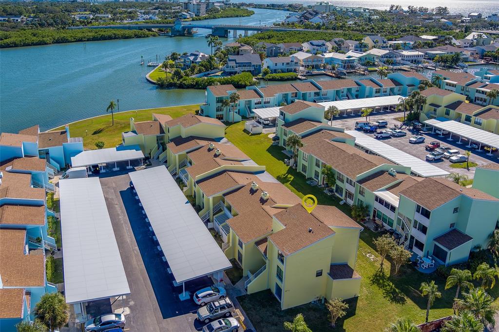 an aerial view of a house with a swimming pool yard and outdoor seating