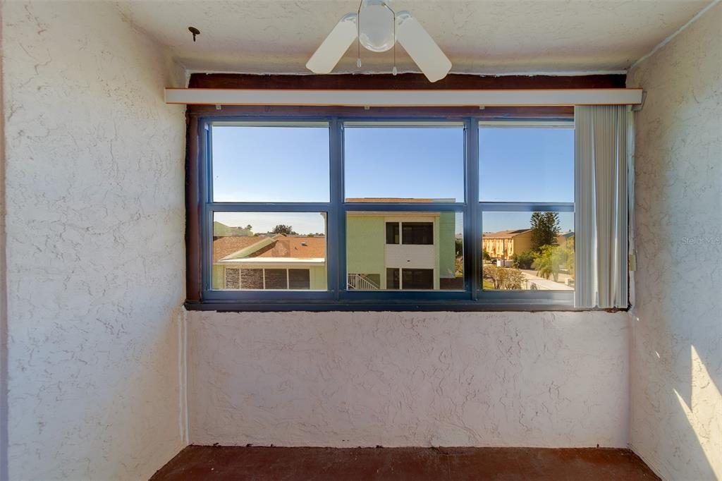 1 Windrush Boulevard, Unit 28 Indian Rocks Beach, FL 33785 - Photo 12 of 68 a view of a window in a room