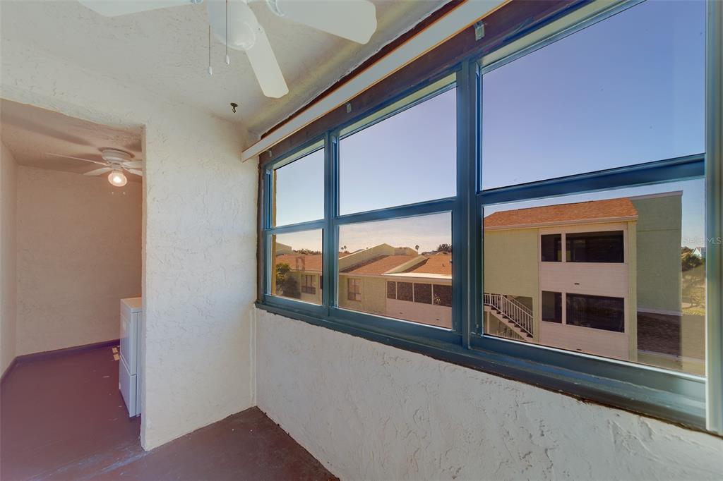 1 Windrush Boulevard, Unit 28 Indian Rocks Beach, FL 33785 - Photo 13 of 68 a view of a building from a window