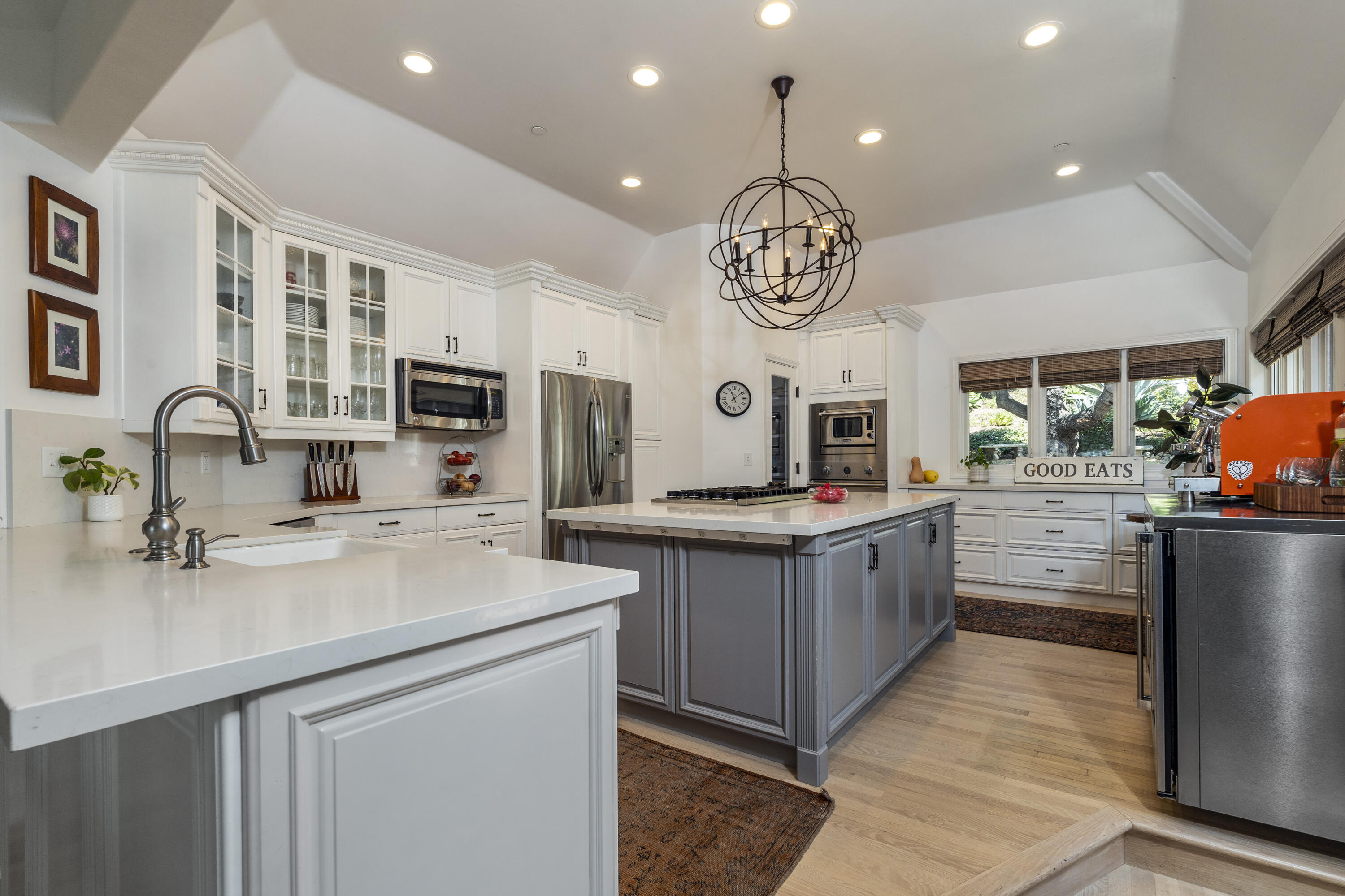 2850 Torito Road Santa Barbara, CA 93108 - Photo 5 of 18 a kitchen with stainless steel appliances a large counter space cabinets and wooden floor