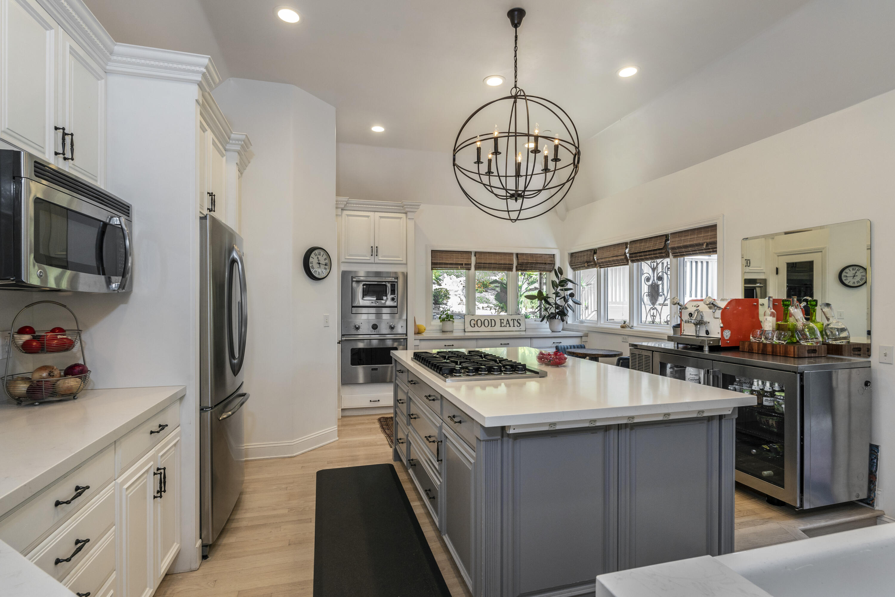 2850 Torito Road Santa Barbara, CA 93108 - Photo 6 of 18 a kitchen with a stove cabinets and a clock
