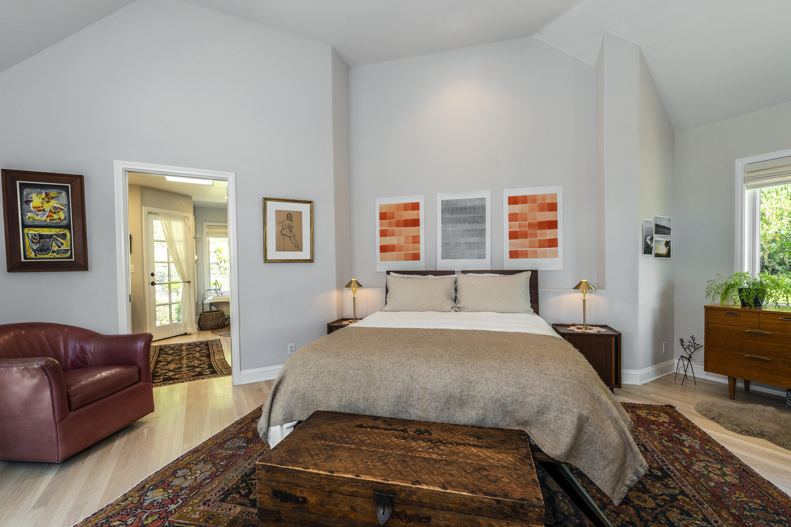 2850 Torito Road Santa Barbara, CA 93108 - Photo 9 of 18 a bedroom with a bed couch and windows