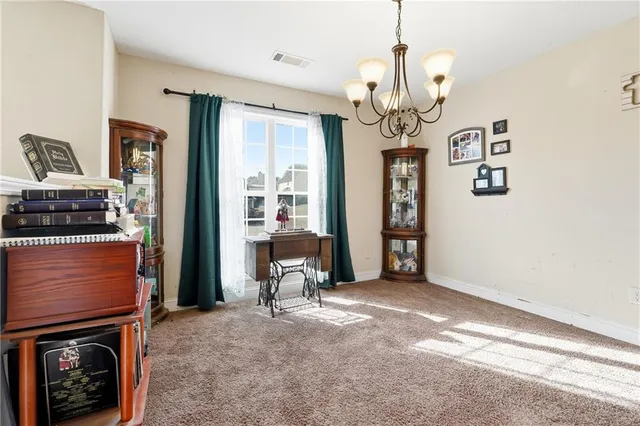 a view of a livingroom with a chandelier