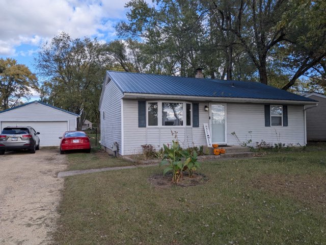 a house view with a backyard space