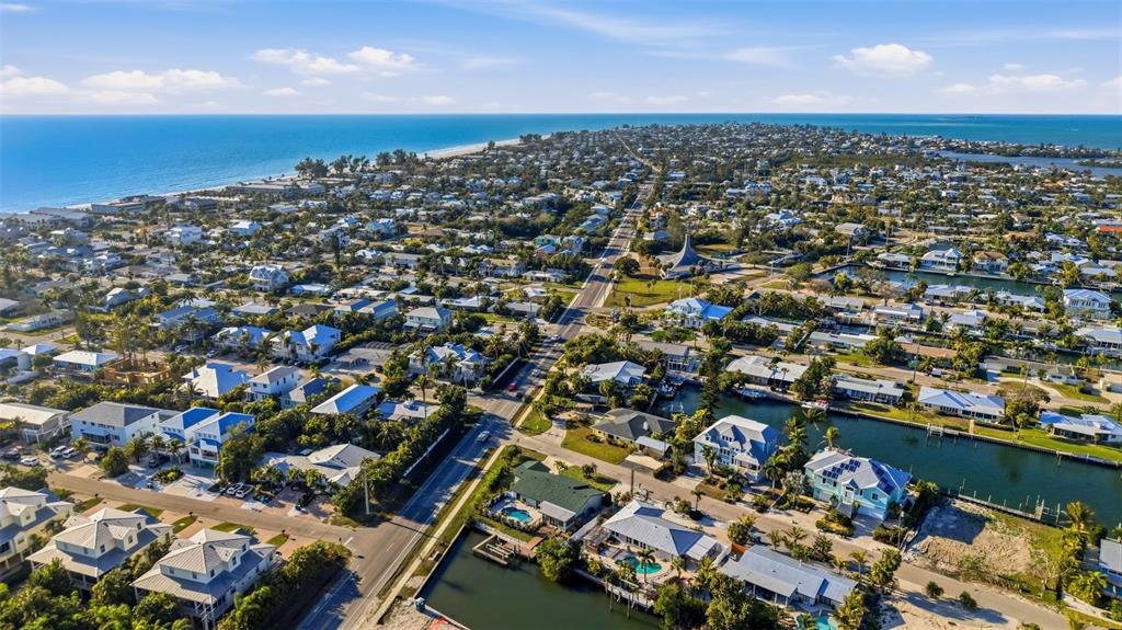 501 65th Street Holmes Beach, FL 34217 - Photo 58 of 61 an aerial view of multiple house