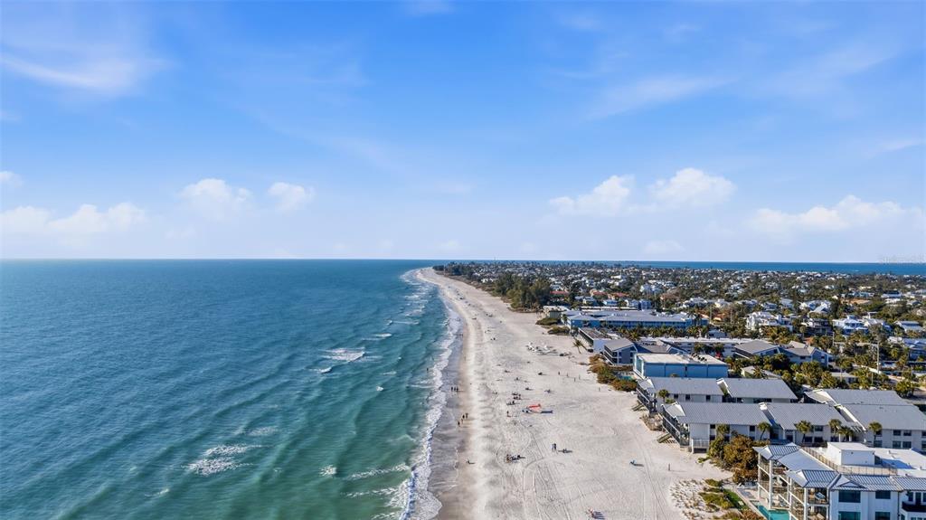 501 65th Street Holmes Beach, FL 34217 - Photo 60 of 61 an aerial view of a city