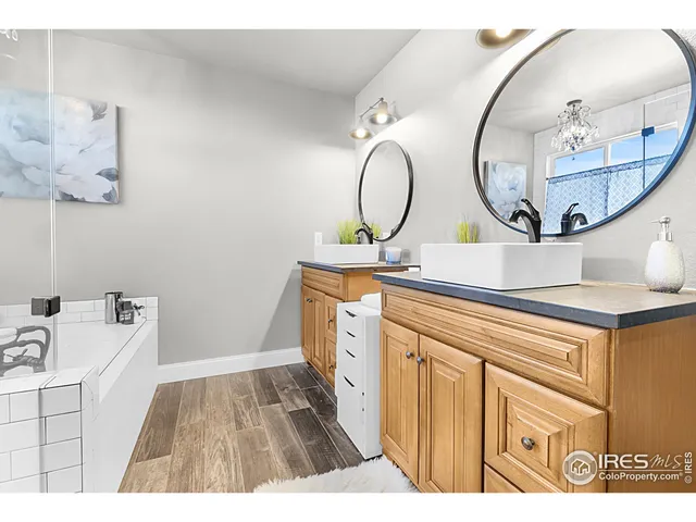 a bathroom with a sink and mirror