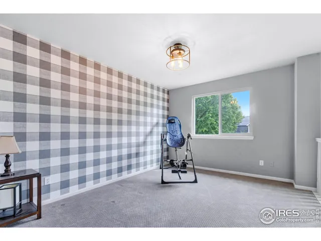 a view of empty room with a couch