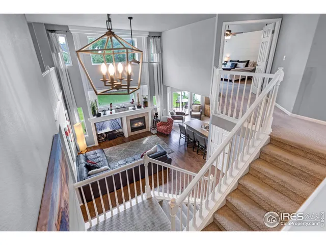 a view of living room and wooden floor