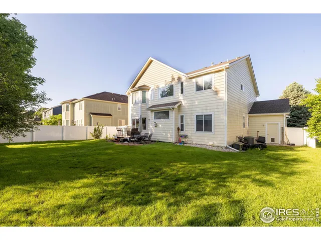 a view of a house with a big yard