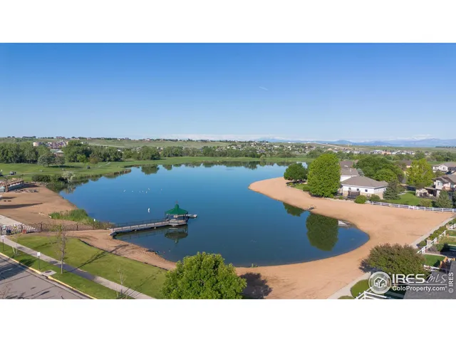 a view of a lake with a city