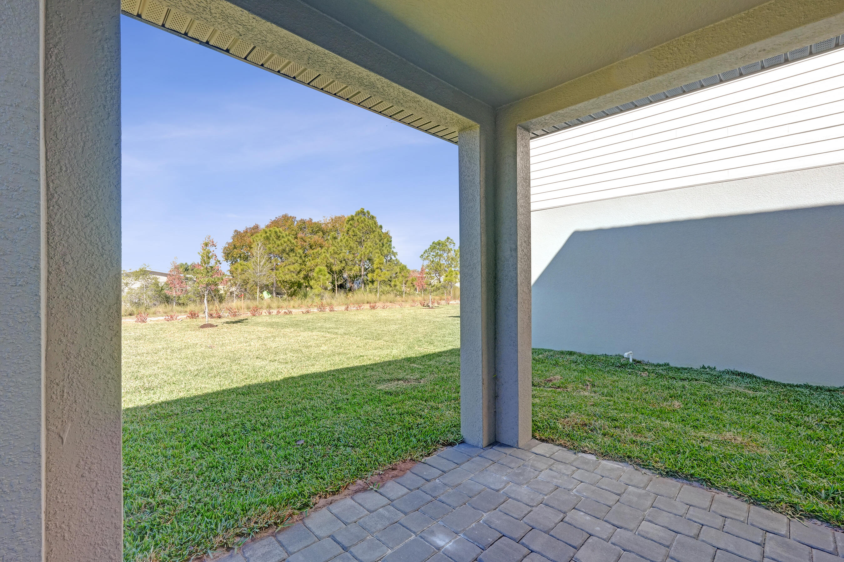 14308 Southwest New Dawn Road Indiantown, FL 34956 - Photo 23 of 25 a view of a large window with a yard