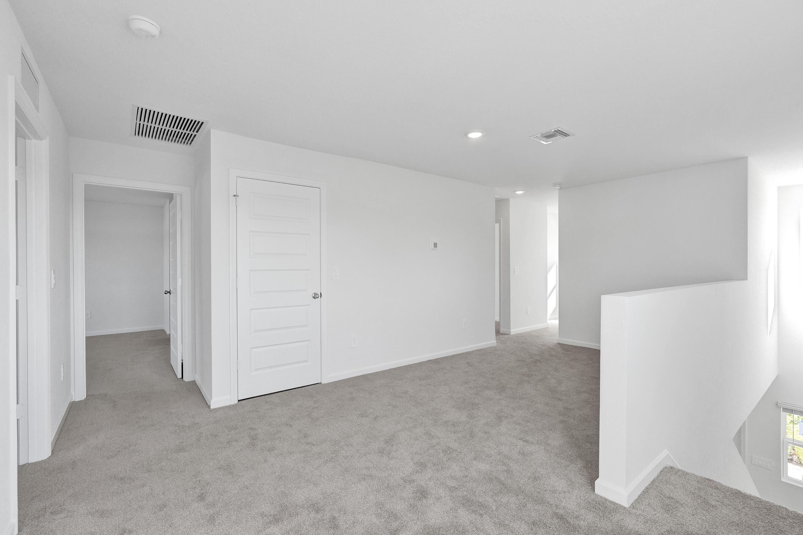14308 Southwest New Dawn Road Indiantown, FL 34956 - Photo 6 of 25 a view of an empty room