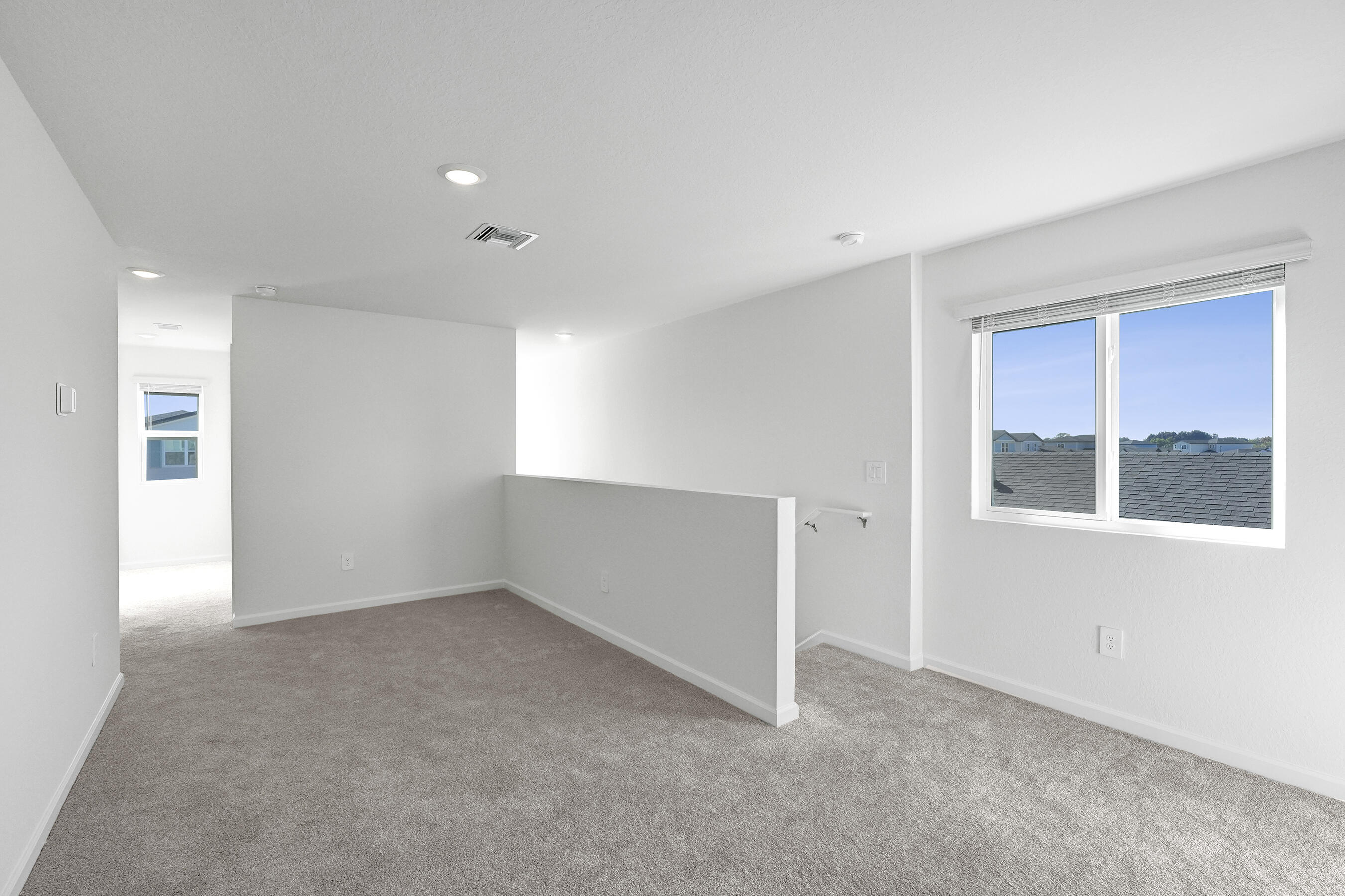 14308 Southwest New Dawn Road Indiantown, FL 34956 - Photo 8 of 25 a view of an empty room with a window