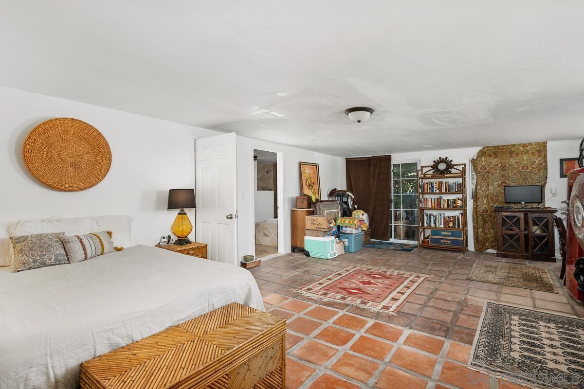 2756 Mission Road Fallbrook, CA 92028 - Photo 11 of 39 a bed room with a bed and a window