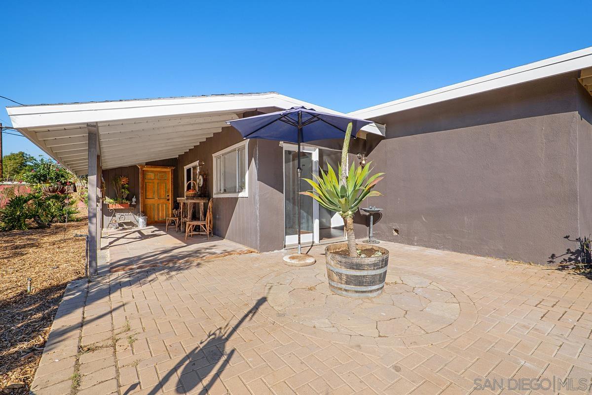 2756 Mission Road Fallbrook, CA 92028 - Photo 13 of 39 a view of a lounge chair and table in the patio