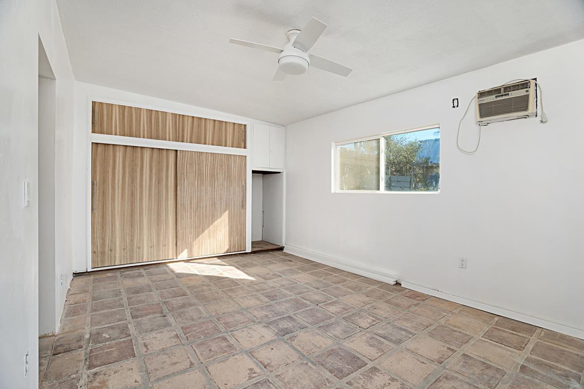 2756 Mission Road Fallbrook, CA 92028 - Photo 17 of 39 an empty room with windows and closet
