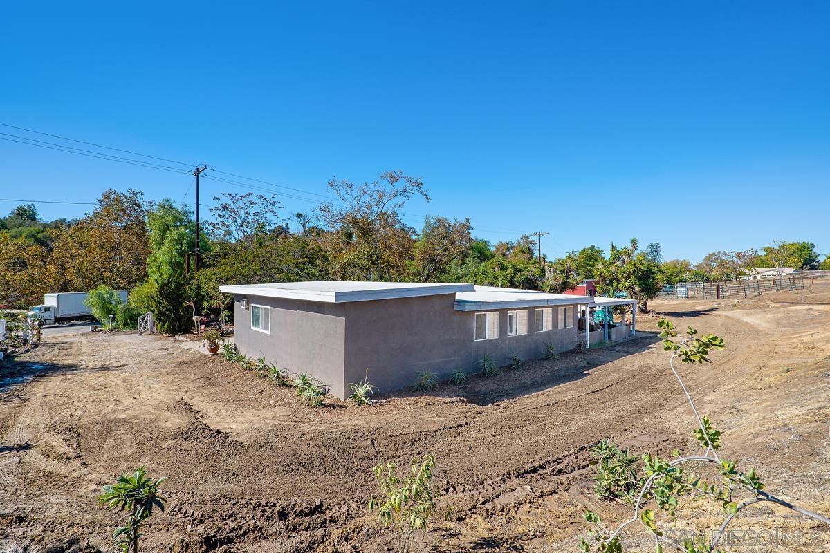 2756 Mission Road Fallbrook, CA 92028 - Photo 24 of 39 a view of a dry yard with wooden fence