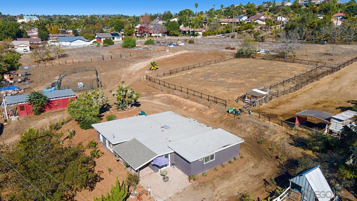 2756 Mission Road Fallbrook, CA 92028 - Photo 3 of 39 an aerial view of a house with a yard
