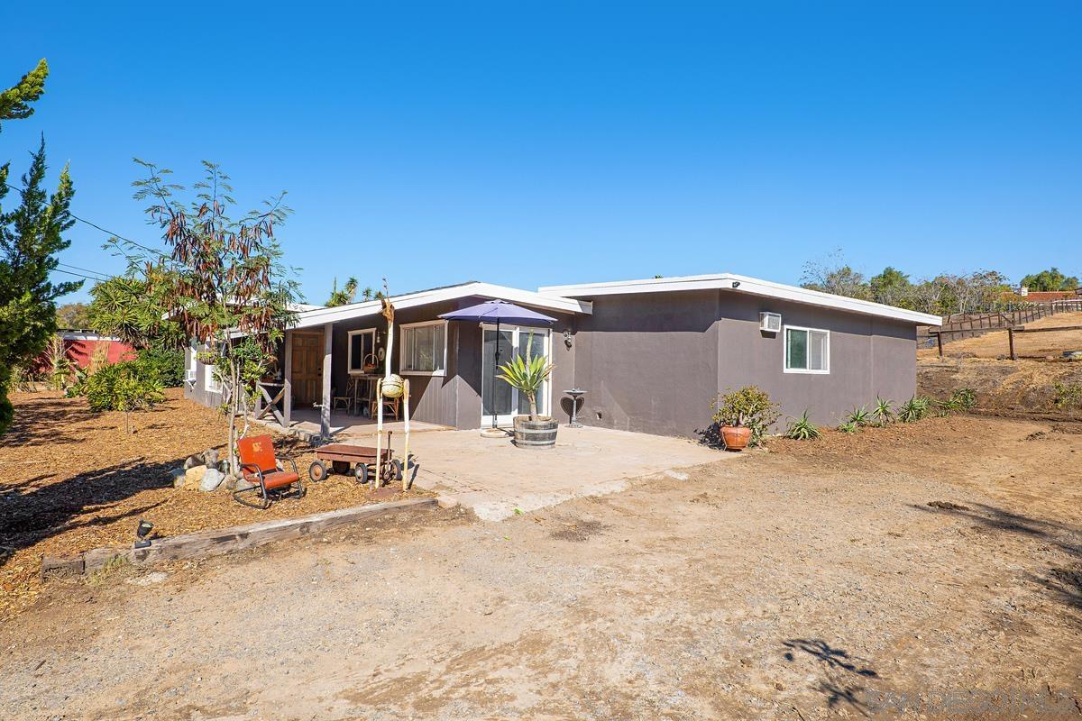 2756 Mission Road Fallbrook, CA 92028 - Photo 5 of 39 a view of a house with backyard and sitting area