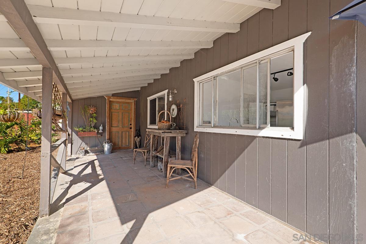 2756 Mission Road Fallbrook, CA 92028 - Photo 6 of 39 a livingroom with furniture wooden floor and a rug