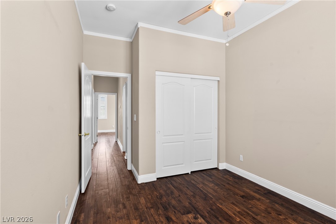 708 Vortex Avenue Henderson, NV 89002 - Photo 40 of 71 Rich hardwood flooring extends throughout this versatile room, offering clean lines and a contemporary aesthetic.