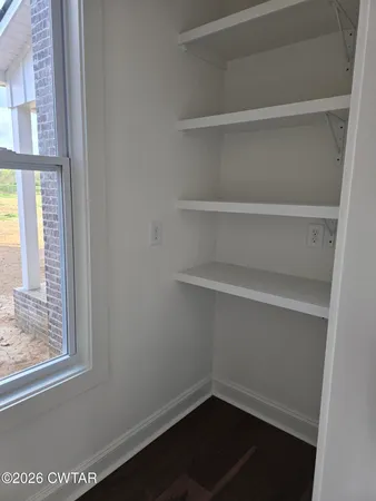 a view of a room with rack on the wall