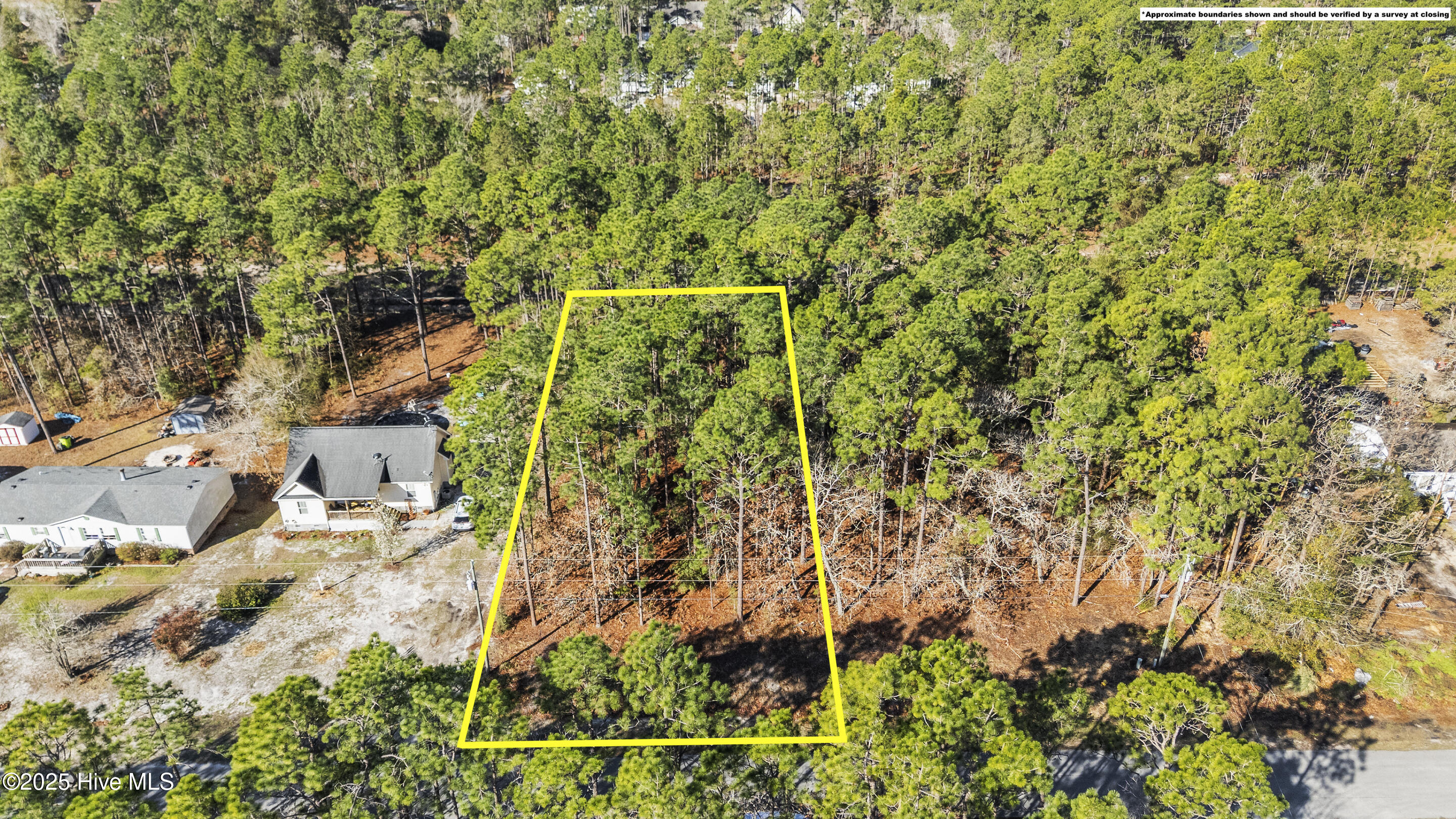 Lot 103 Cherokee Road Southport, NC 28461 - Photo 1 of 17 Approximate homesite boundaries marked with yellow lines