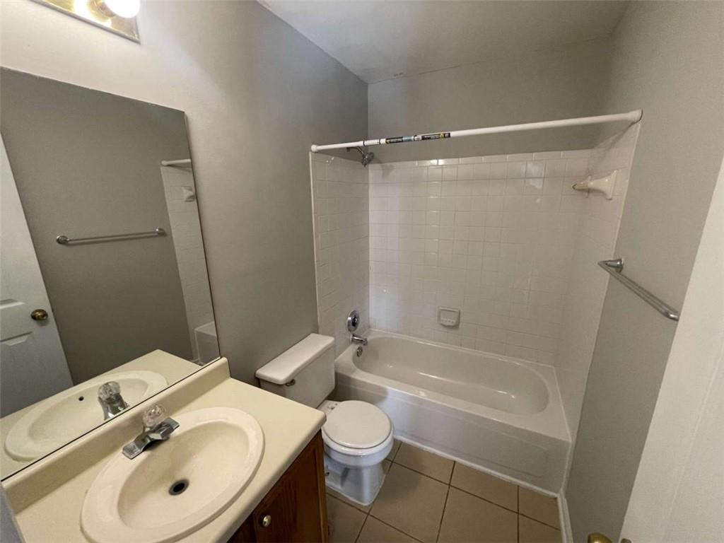 6387 Seths Way Lithonia, GA 30058 - Photo 19 of 44 a bathroom with a sink toilet and shower