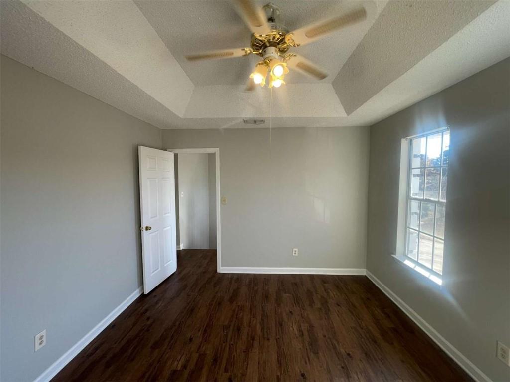 6387 Seths Way Lithonia, GA 30058 - Photo 32 of 44 wooden floor in an empty room with a window